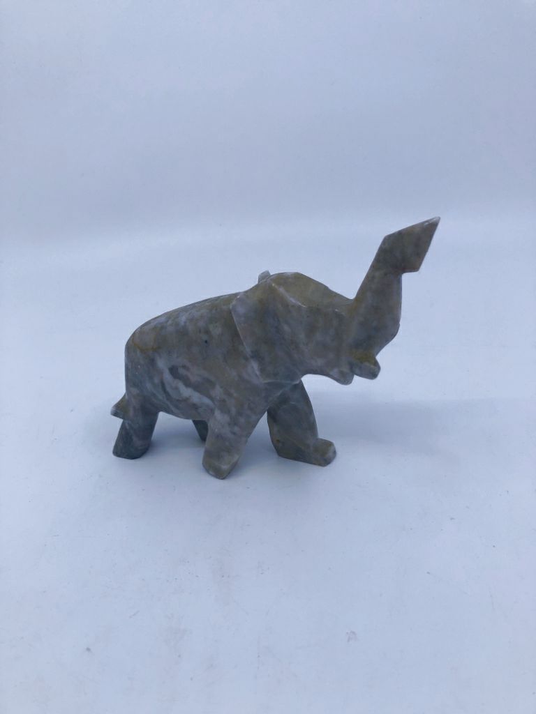 GREY STONE CARVED ELEPHANT.