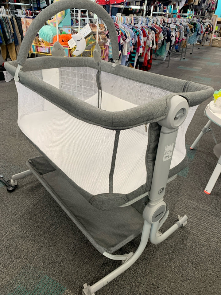 Cowiewie Baby Bassinet Bedside Crib with Storage Basket, Wheels and Toys, Portab