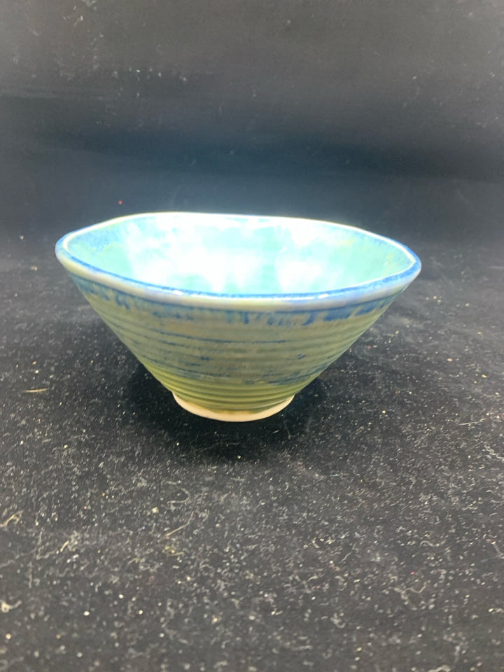 SMALL BLUE POTTERY BOWL.