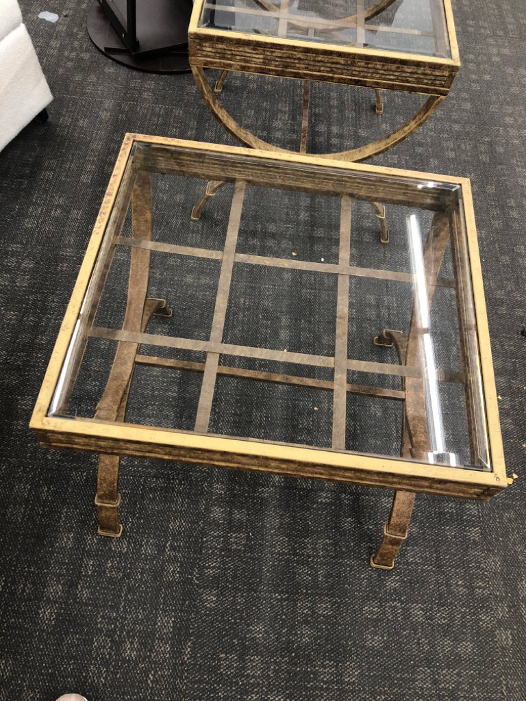 GOLD DISTRESSED SIDE TABLE W/GLASS TOP.