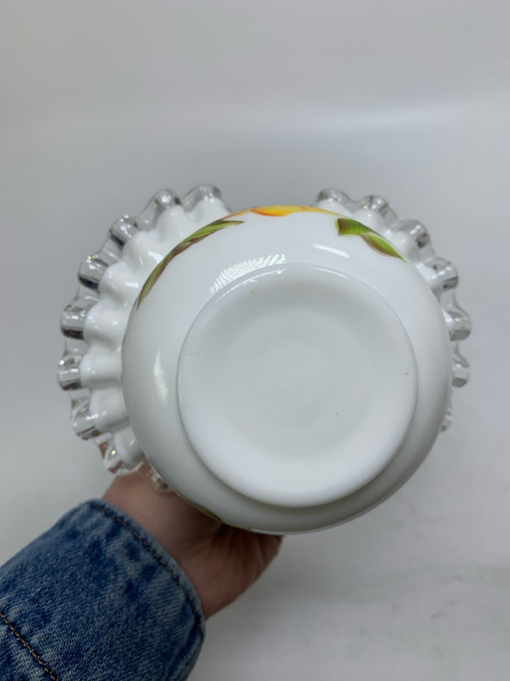 MILK GLASS BASKET W/ PAINTED YELLOW FLOWERS CLEAR HANDLE.