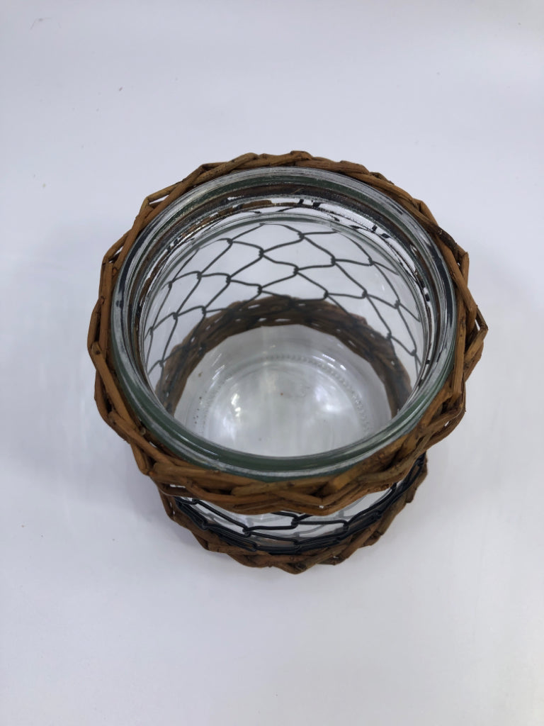 CHICKEN WIRE COVERED GLASS VASE.