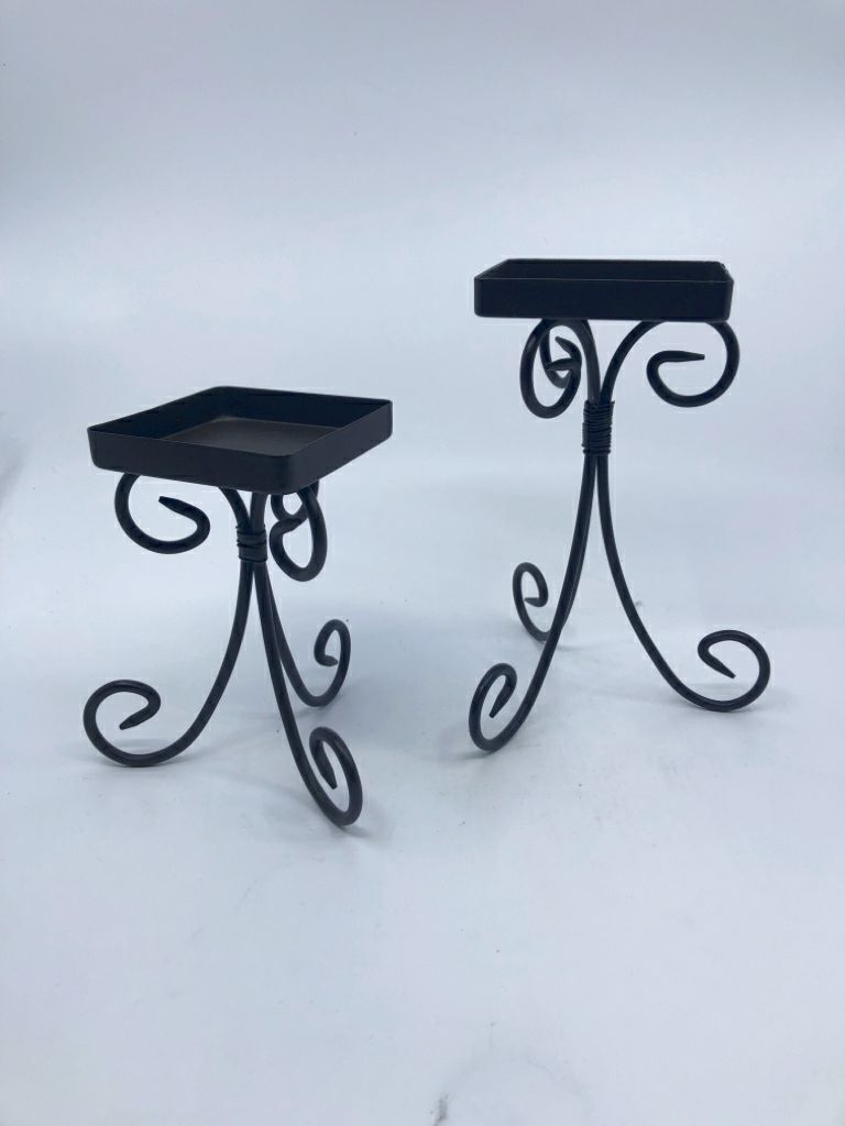 2 SQUARE BLACK CANDLE HOLDERS.