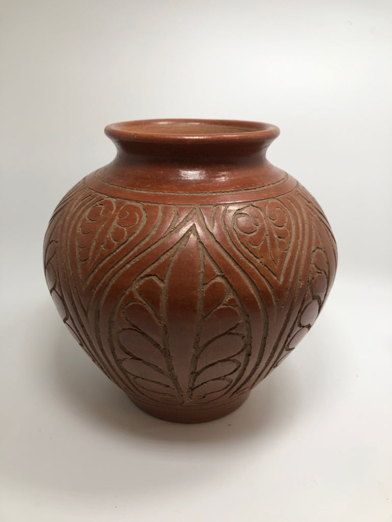HEAVY RED CARVED POTTERY VASE.