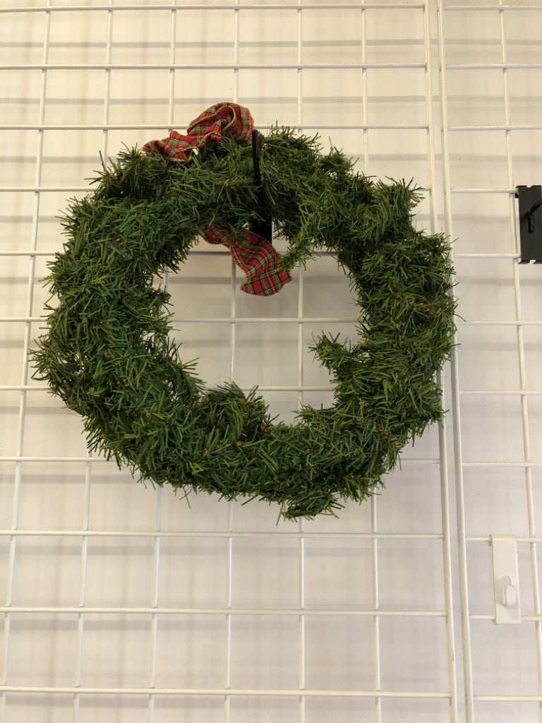 GREENS WREATH W/ PLAID BOW.