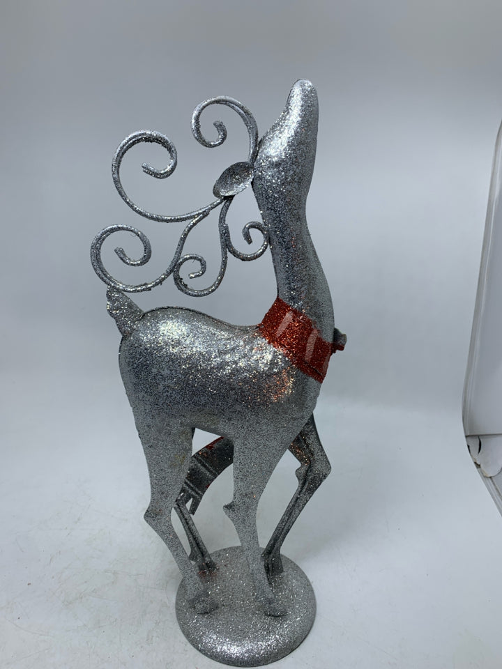 SILVER METAL SPARKLE REINDEER W/ RED SCARF.