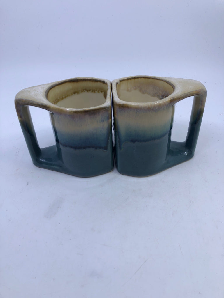 2 DRIP GLAZE POTTERY BLUE MUGS.