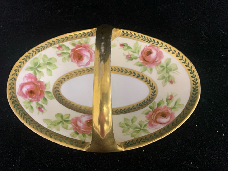 VTG OVAL DISH W PINK ROSES/GOLD ACCENTS AND HANDLE.