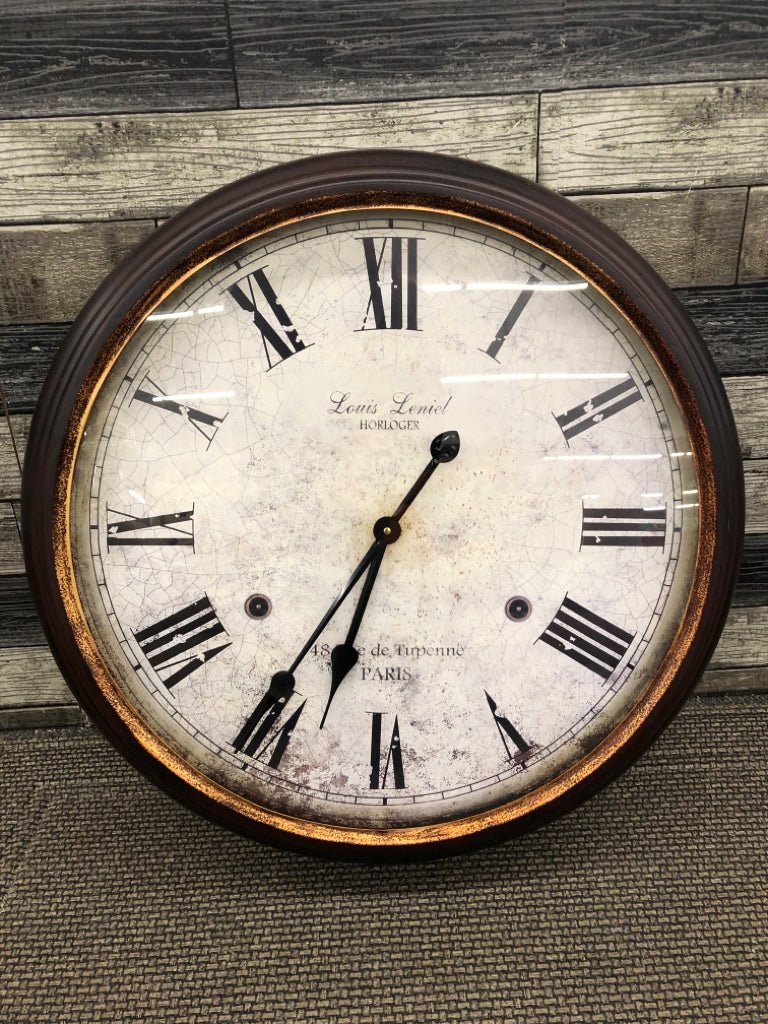 LARGE CLOCK IN BROWN FRAME- LOUIS LENIEL HORLGER.