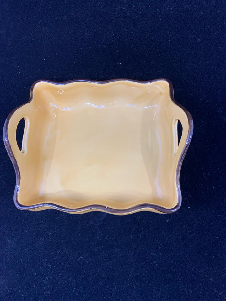 SMALL YELLOW SQUARE BROWN EDGE HANDLES BAKING DISH.