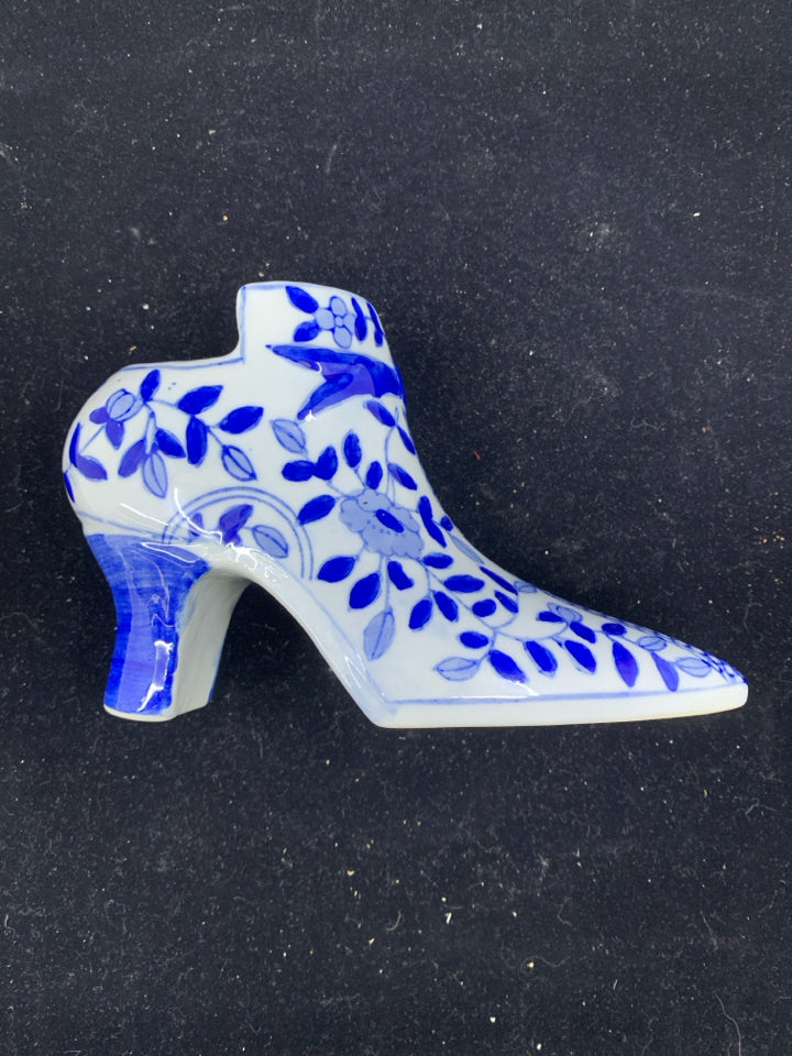 BLUE AND WHITE SHOE PLANTER.