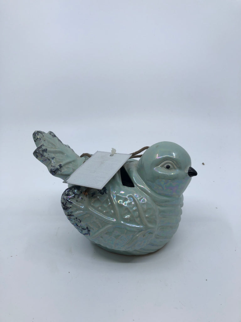 CERAMIC BLUE METALLIC PIERCED BIRD.