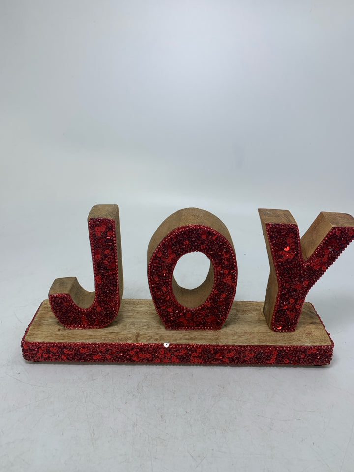 WOOD "JOY" W/ RED SEQUENCE SIGN.