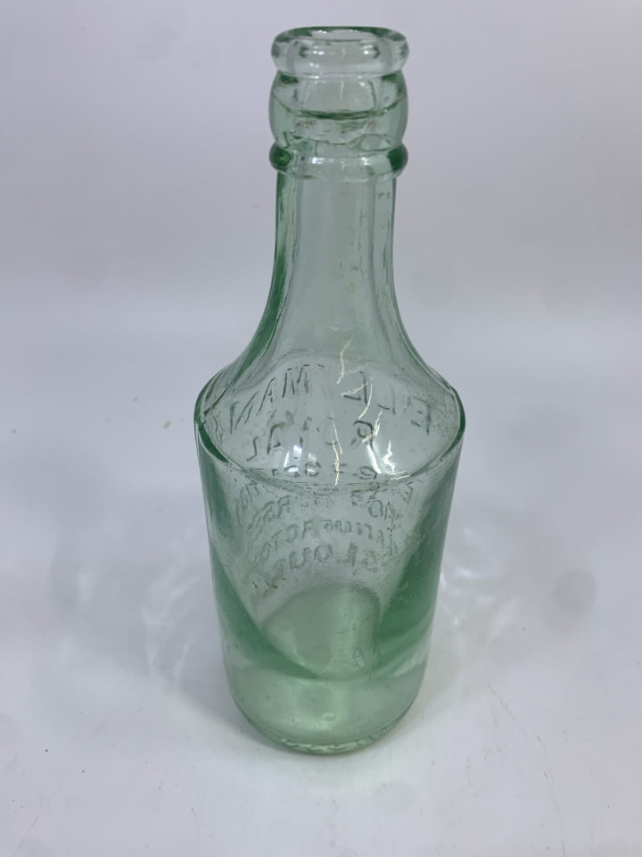 CLEAR GLASS ELLIMANS ROYAL GLASS BOTTLE DECOR.