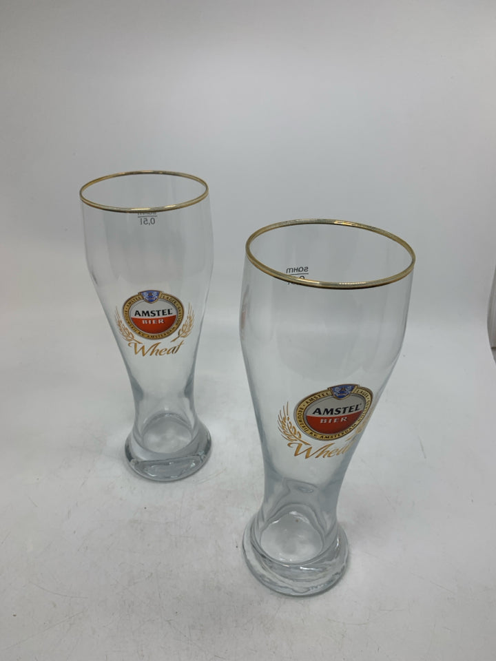 2 AMSTEL LAGER PILSNER GLASSES.