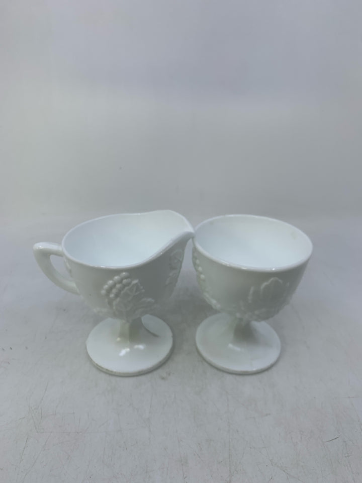 2 PC FOOTED WHITE GLASS W/ EMBOSSED GRAPES.