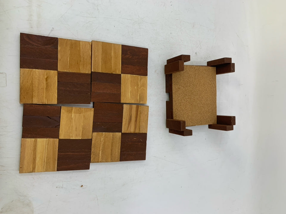 4 2-TONED WOOD COASTERS IN STAND.