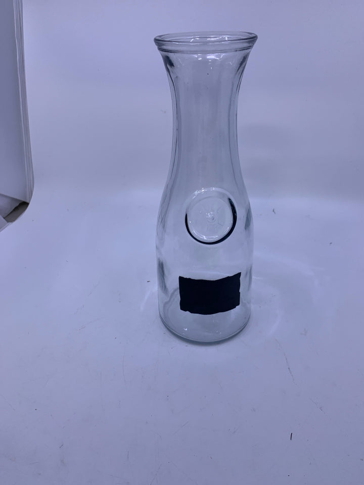 GLASS CARAFE WITH CHALK LABEL.