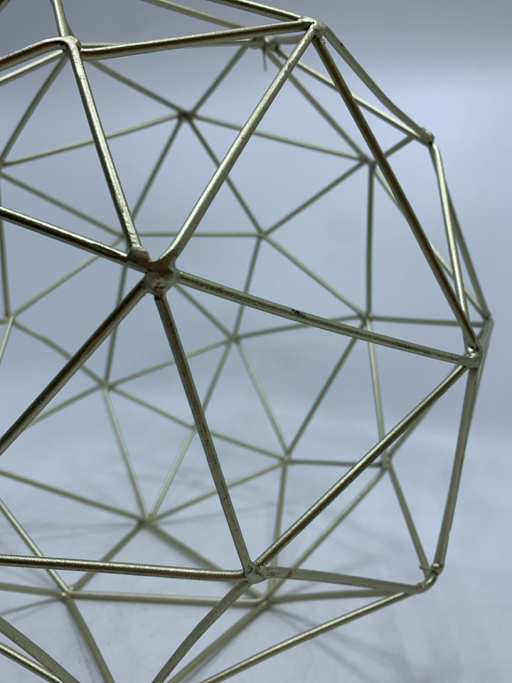 GOLD PAINTED GEOMETRIC SPHERE.