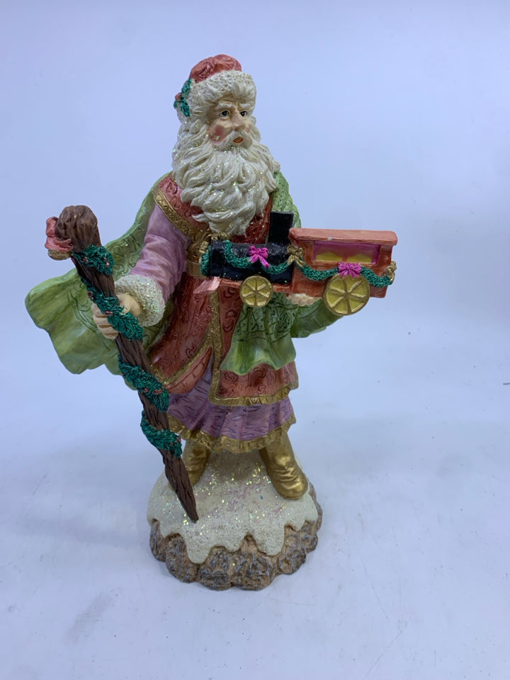 RESIN SPARKLE SANTA HOLDING STICK/TRAIN.