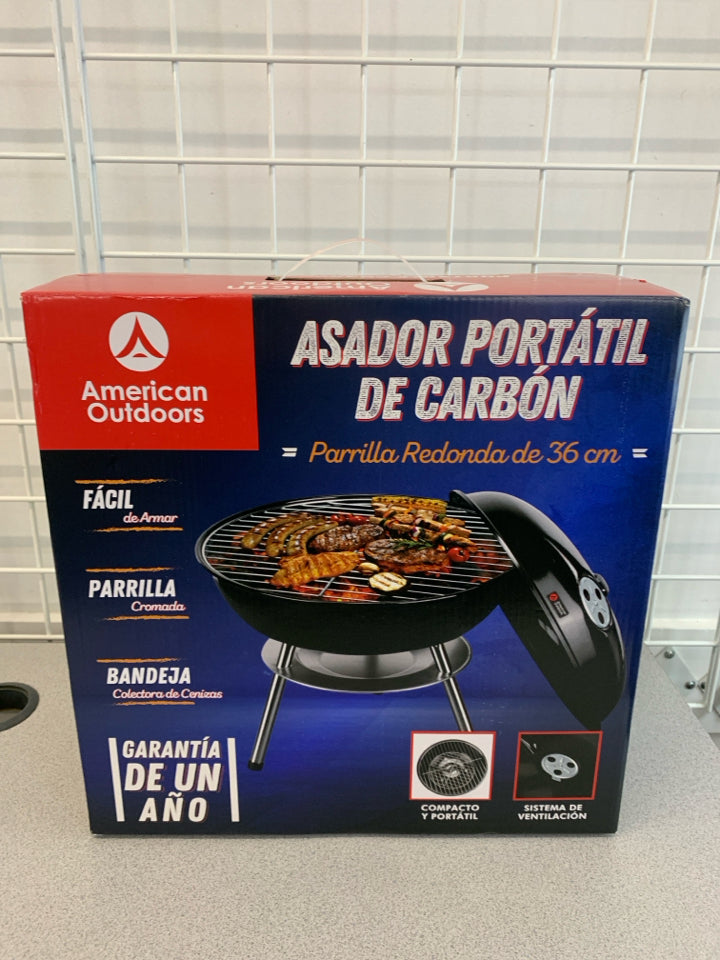 NIB PORTABLE CHARCOAL GRILL.