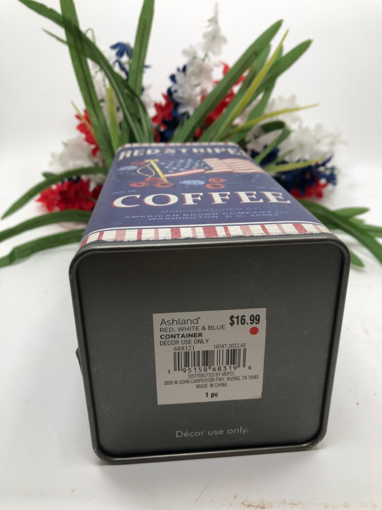 AMERICANA TIN W/ RED,WHITE,BLUE FAUX FLOWERS.