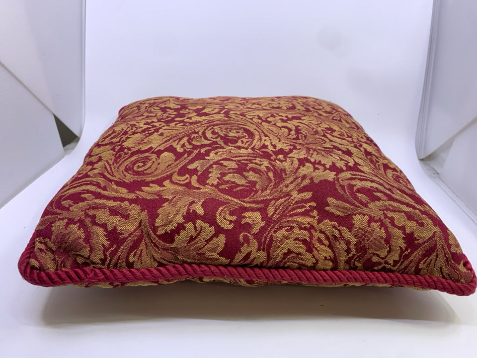 RED W/GOLD FLORAL ACCENT PILLOW.