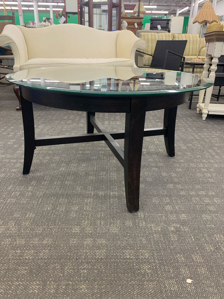 GLASS TOP METAL COFFEE TABLE.