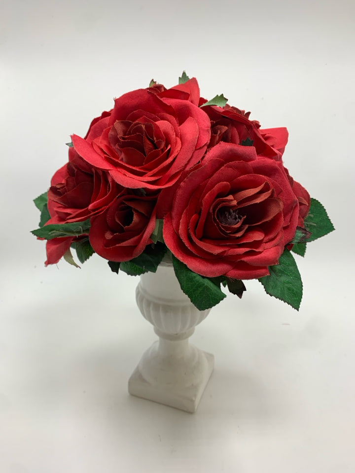 RED ROSES IN WHITE URN VASE.