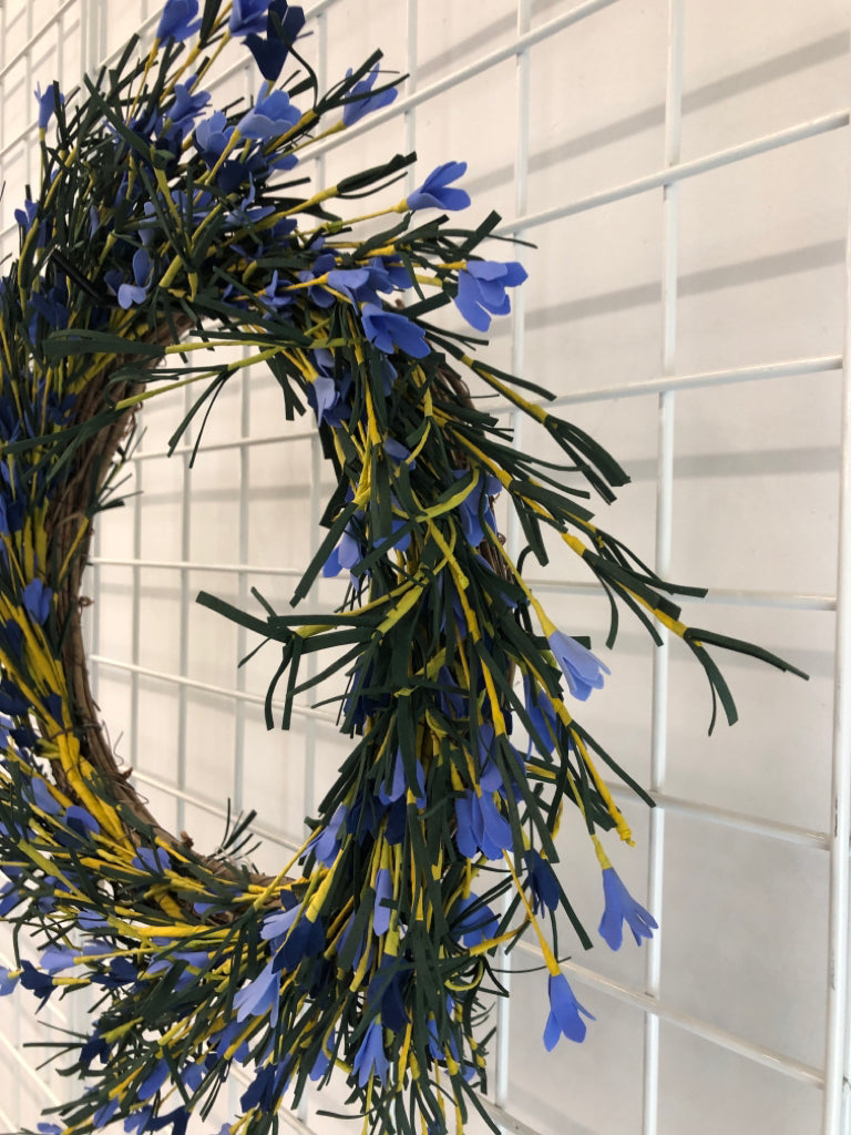 BLUE/YELLOW FOAM FLOWER WREATH.
