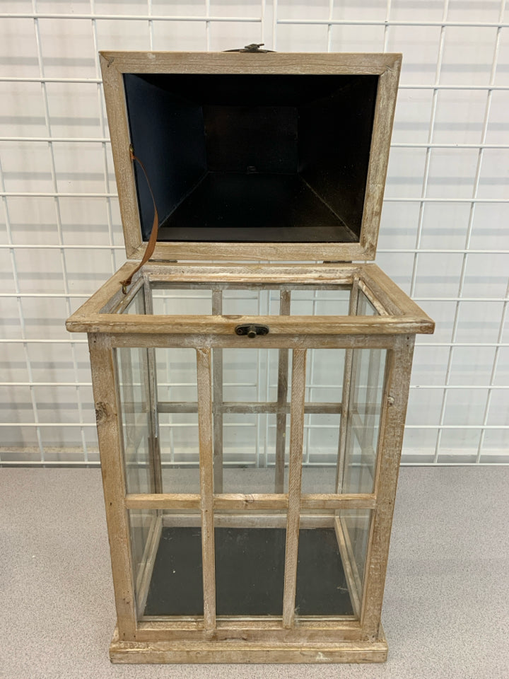 WOOD LANTERN W/BLACK METAL TOP.