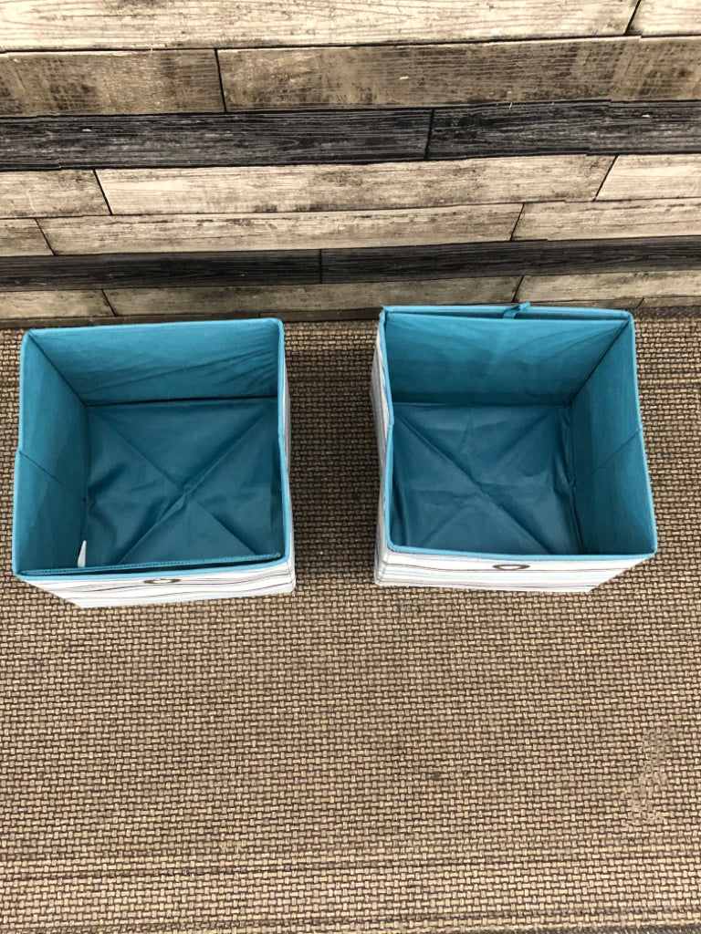 2 BLUE/TEAL FABRIC STORAGE BOXES.