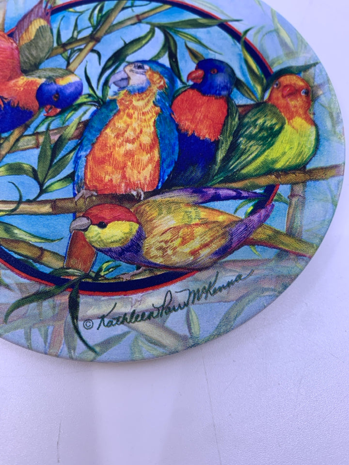 4 ROUND POTTERY COASTERS BIRDS.