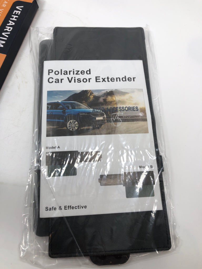 NIB CAR VISOR EXTENDER.
