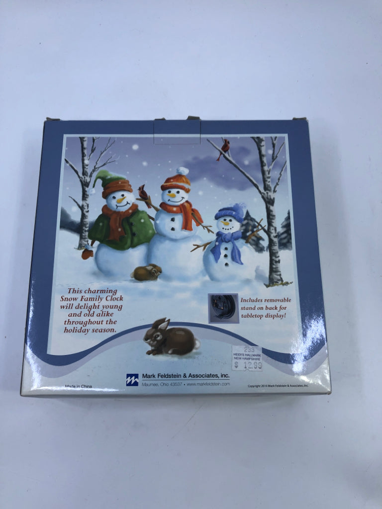 NIB SNOW FAMILY CHRISTMAS CAROL CLOCK.