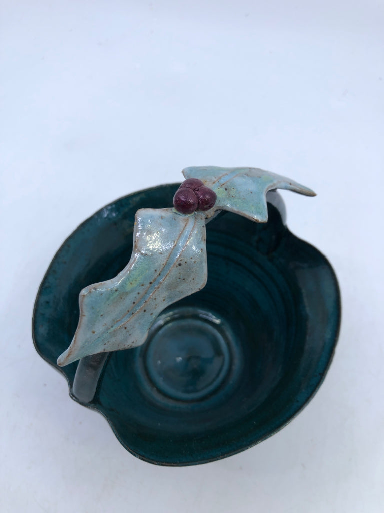 GREEN/TEAL POTTERY BASKET W/ EMBOSSED HOLLY.