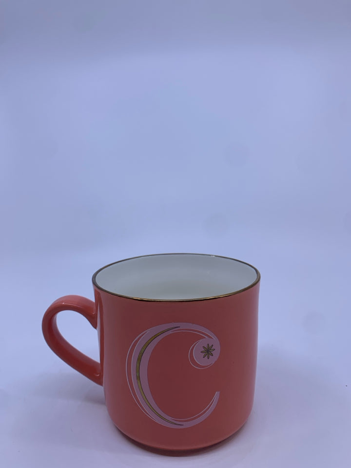 SALMON COLORED MUG W/ GOLD "C".