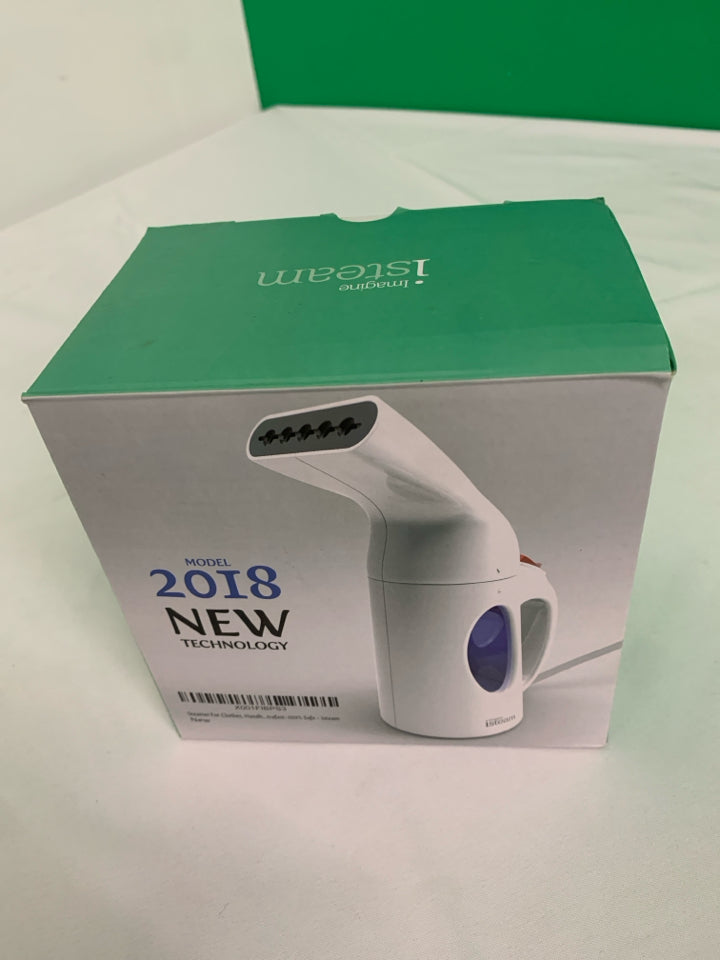 NIP HAND HELD CLOTHES STEAMER.