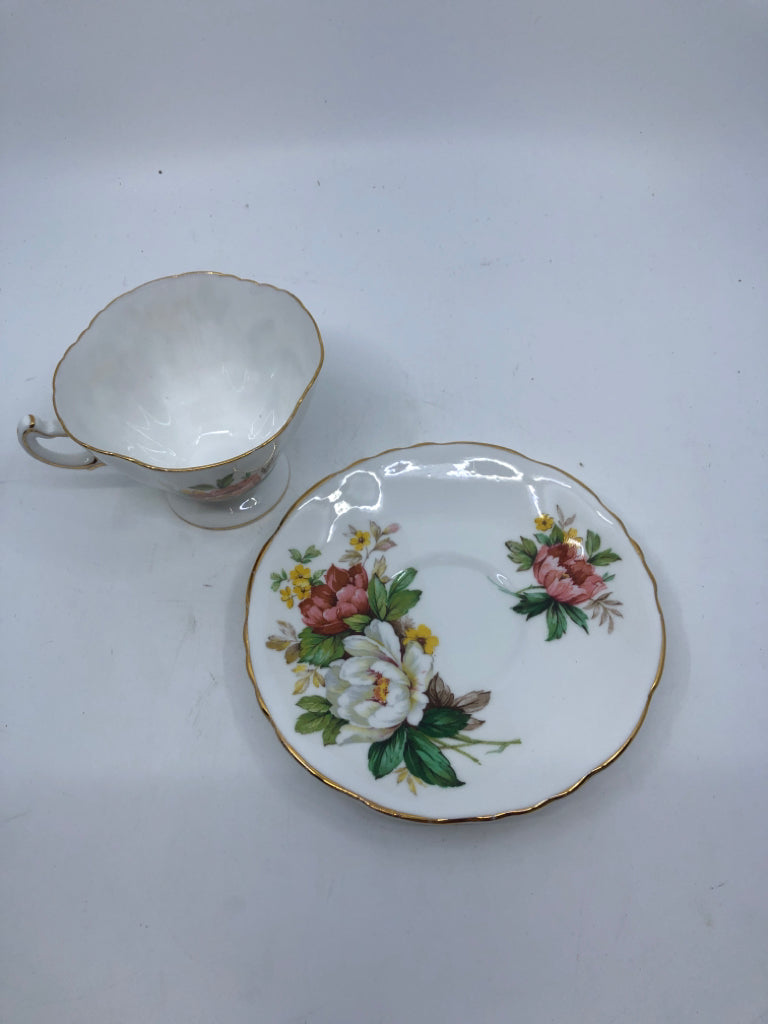 VTG BONE CHINA PINK AND WHITE FLORAL TEACUP AND SAUCER.