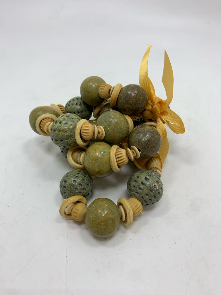 4PK STONE BEAD NAPKIN RINGS.