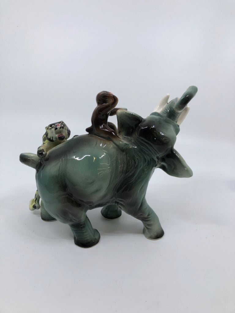 CERAMIC ELEPHANT FIGURINE W/TIGER AND MONKEY.