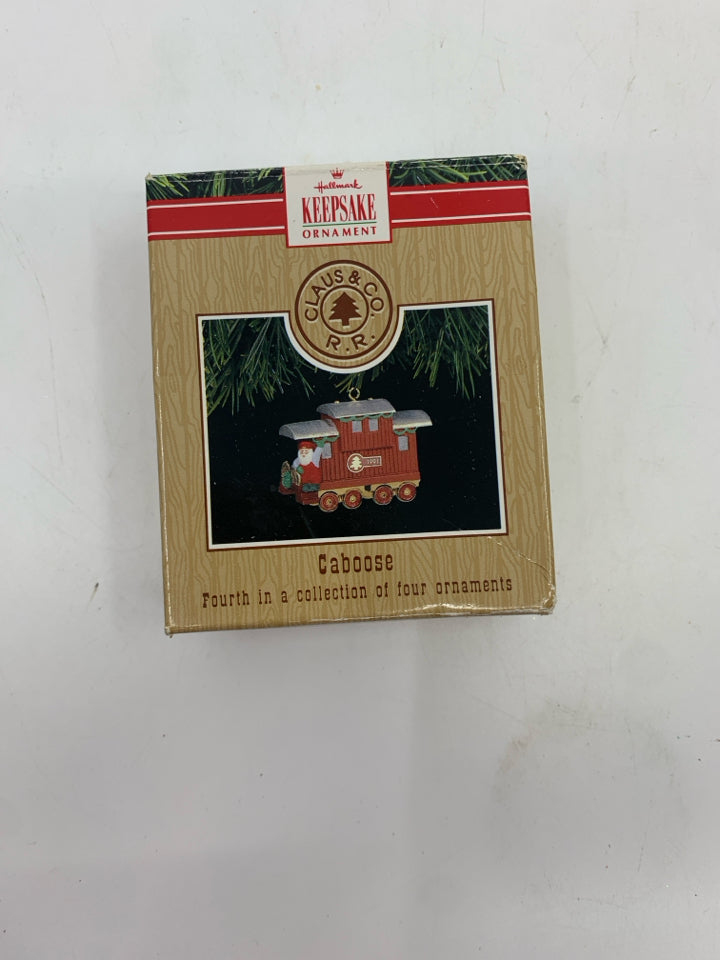 HALLMARK CABOOSE ORNAMNET IN BOX.