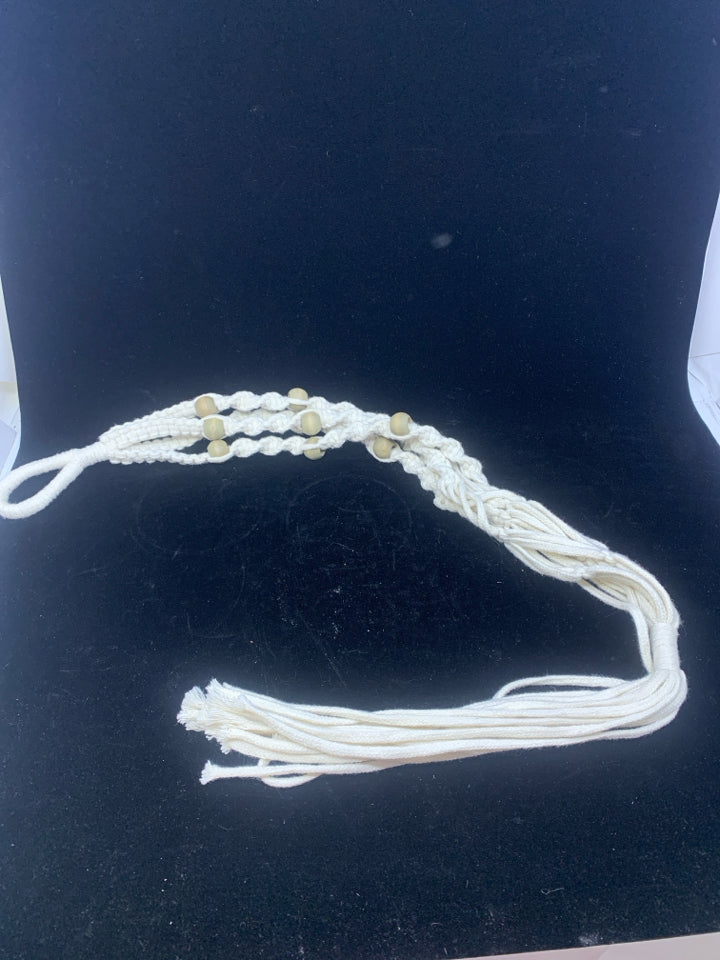 WHITE BEADED MACRAME PLANT HOLDER.