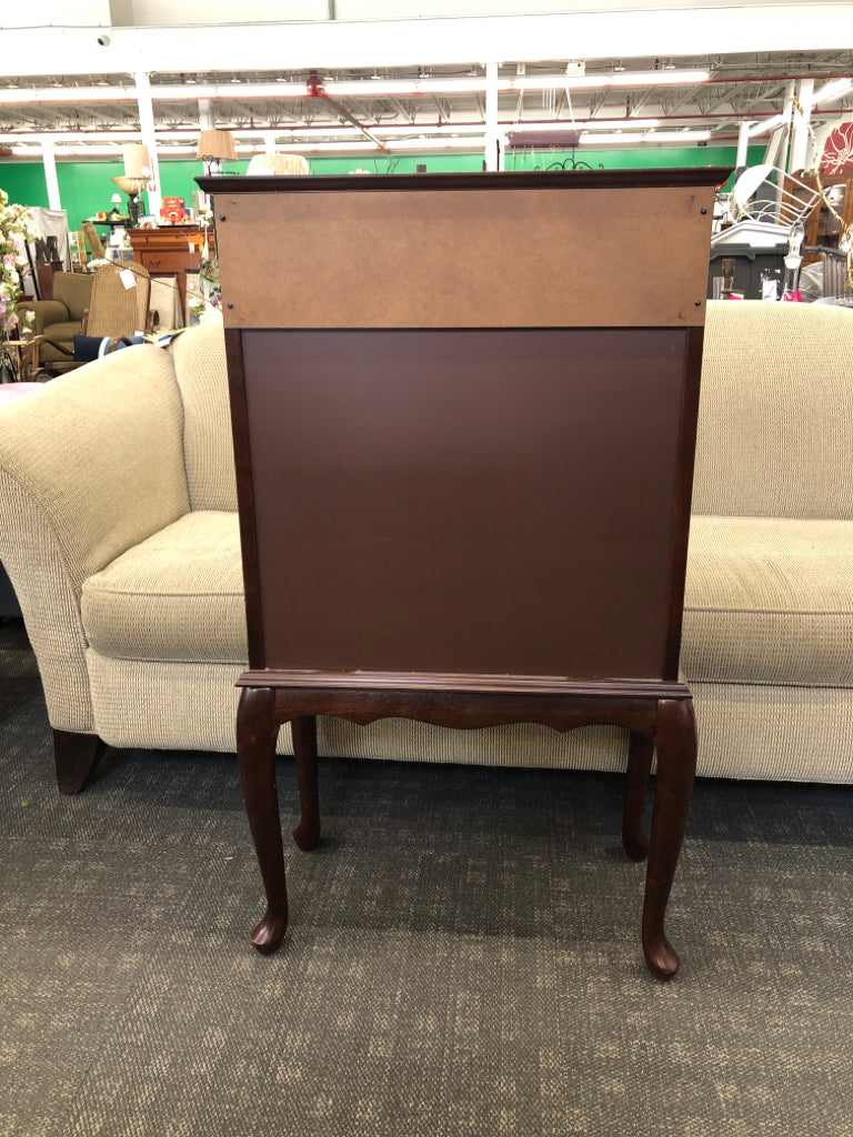 SMALL CHERRY WOOD CABINET W GLASS SHELVES AND DOORS.