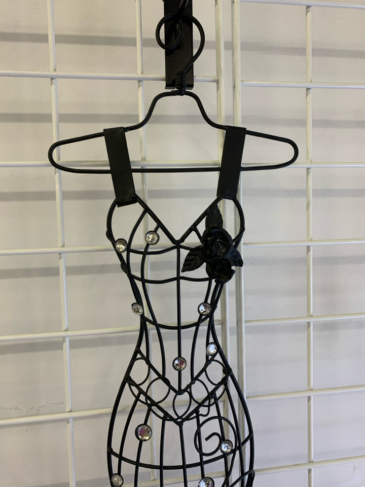 BLACK METAL FORM WHITE CRYSTALS DRESS ON HANGER.