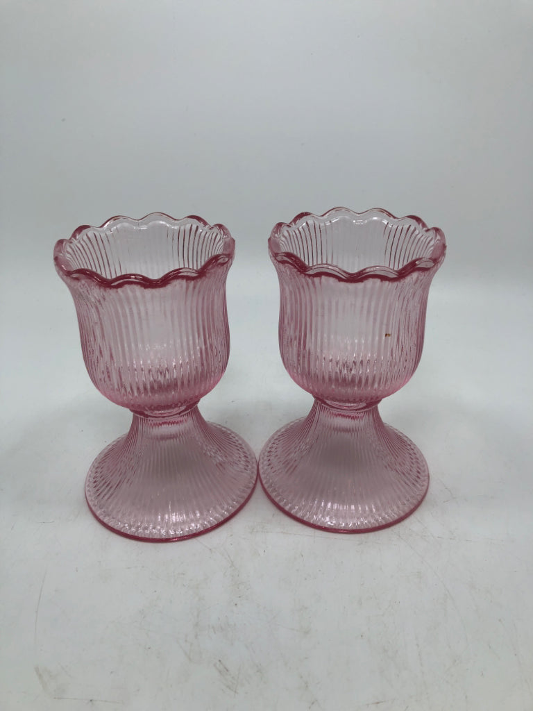 2 PINK RIBBED FLOWER SHAPED VOTIVE HOLDERS.
