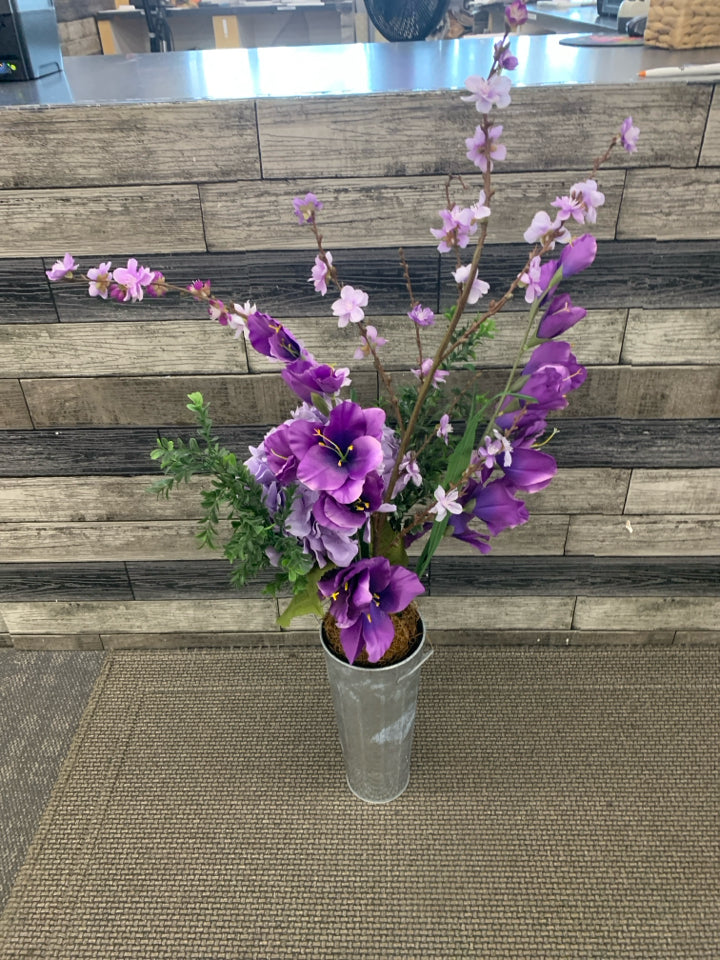 FAUX PURPLE FLORAL IN METAL PLANTER.
