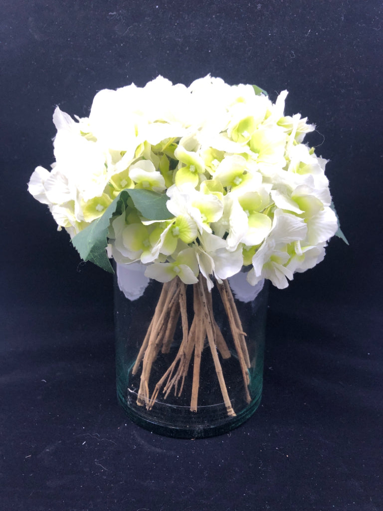 CYLINDER GLASS VASE W/WHITE HYDRANBGEA FLOWERS.