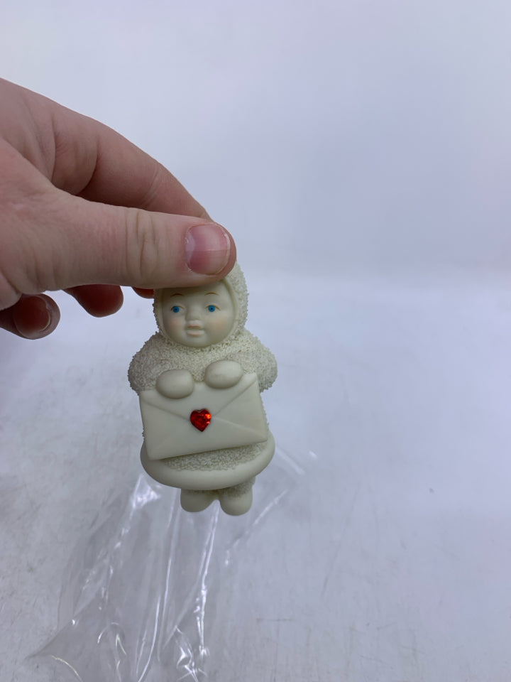 SNOWBABIES BABY HOLDING ENVELOPE W/ RED GEM IN BAG.