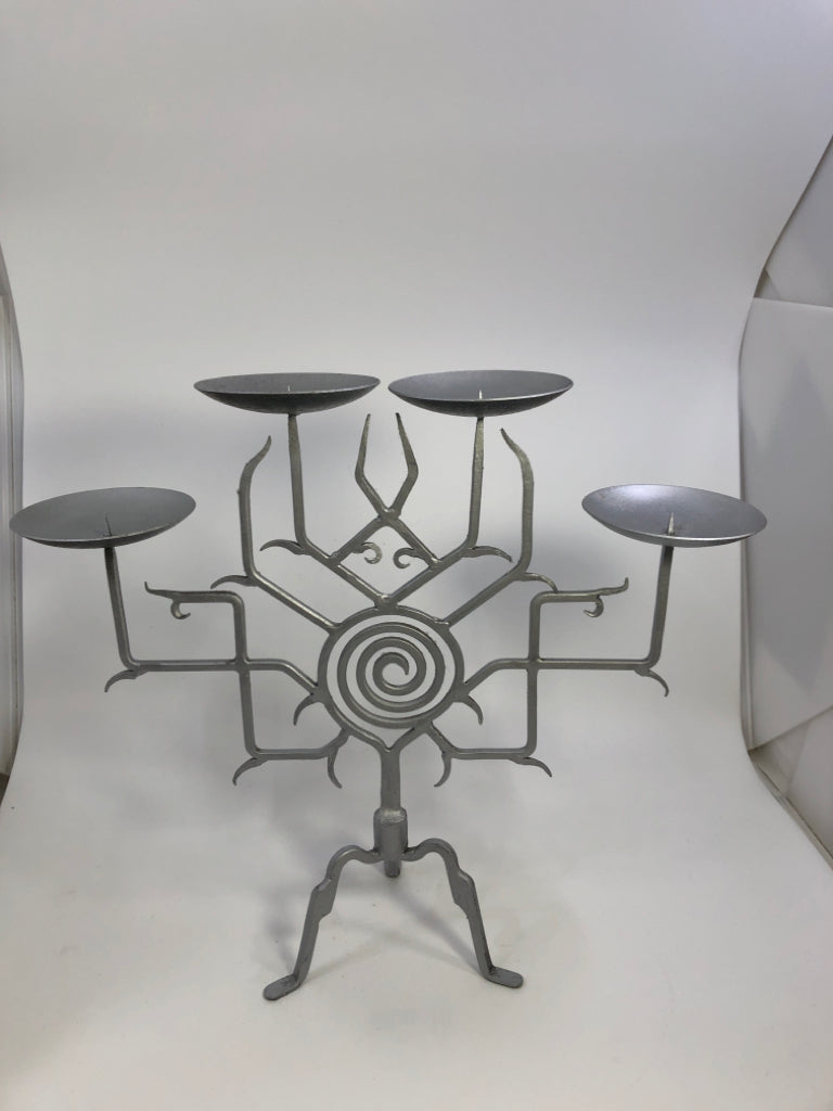 SILVER PAINTED METAL 4 SECTION CANDLE HOLDER.
